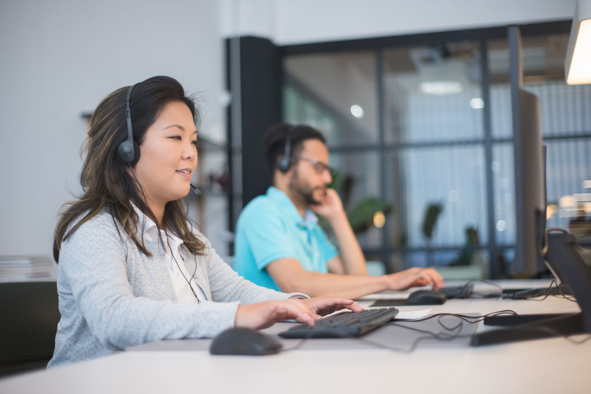 Business owner reviewing an IT services contract with pricing breakdown